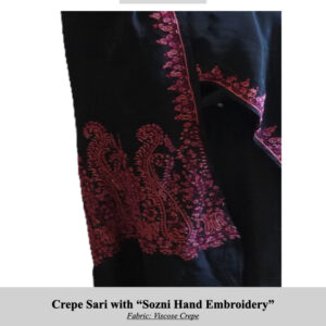 SKU H0021: Black crepe sari with pink Sozni hand embroidery along the border; handmade by displaced Kashmiri women.