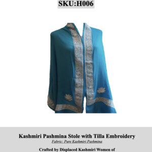 Blue Kashmiri Pashmina stole with silver tilla embroidery along the borders, SKU H006, on display.